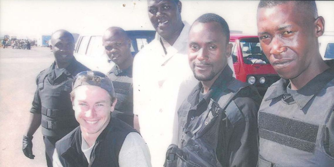 Sensei San Ndlovu, second from right in a black tactical vest, with fellow performers on the set of Lord of War